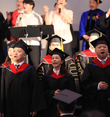 Students singing together at Logos Evangelical Seminary