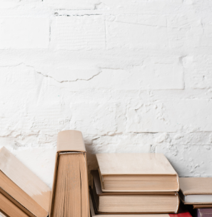 Books stacked on a desk